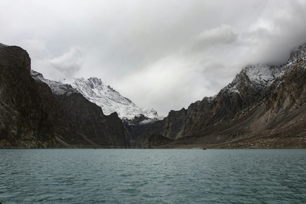 Snow-covered mountain above a lake